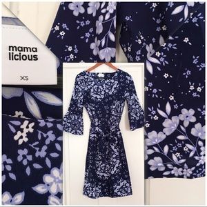 Belted maternity dress.